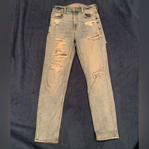 American Eagle Jeans. Ripped, distressed jeans in back and front. Regular.